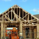 A construction site with a building being built.